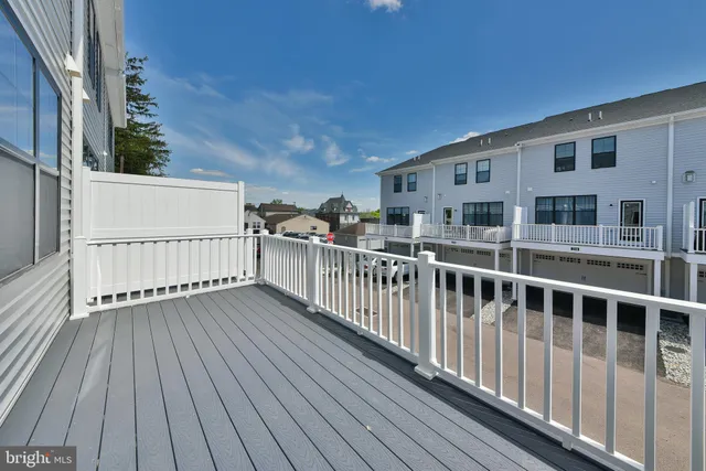 a view of a house with a roof deck