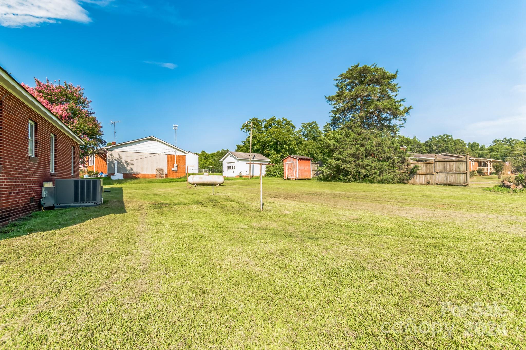1209 White Store Road Wadesboro, NC 28170 - Photo 29 of 30 a view of a swimming pool with an outdoor space and seating area