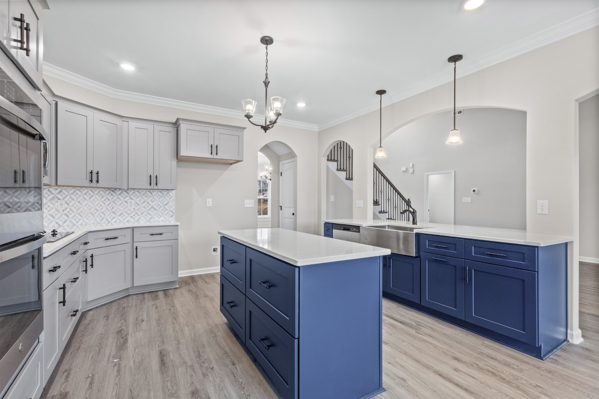 1173 Juniper Pass Clarksville, TN 37043 - Photo 15 of 51 a kitchen with a sink stove and wooden floor