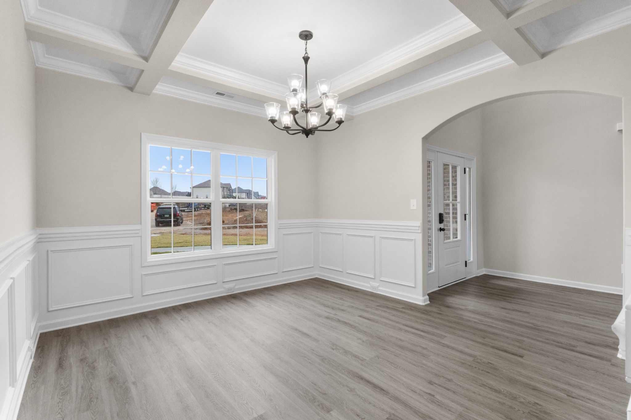 1173 Juniper Pass Clarksville, TN 37043 - Photo 20 of 51 a view of an empty room with a window and wooden floor