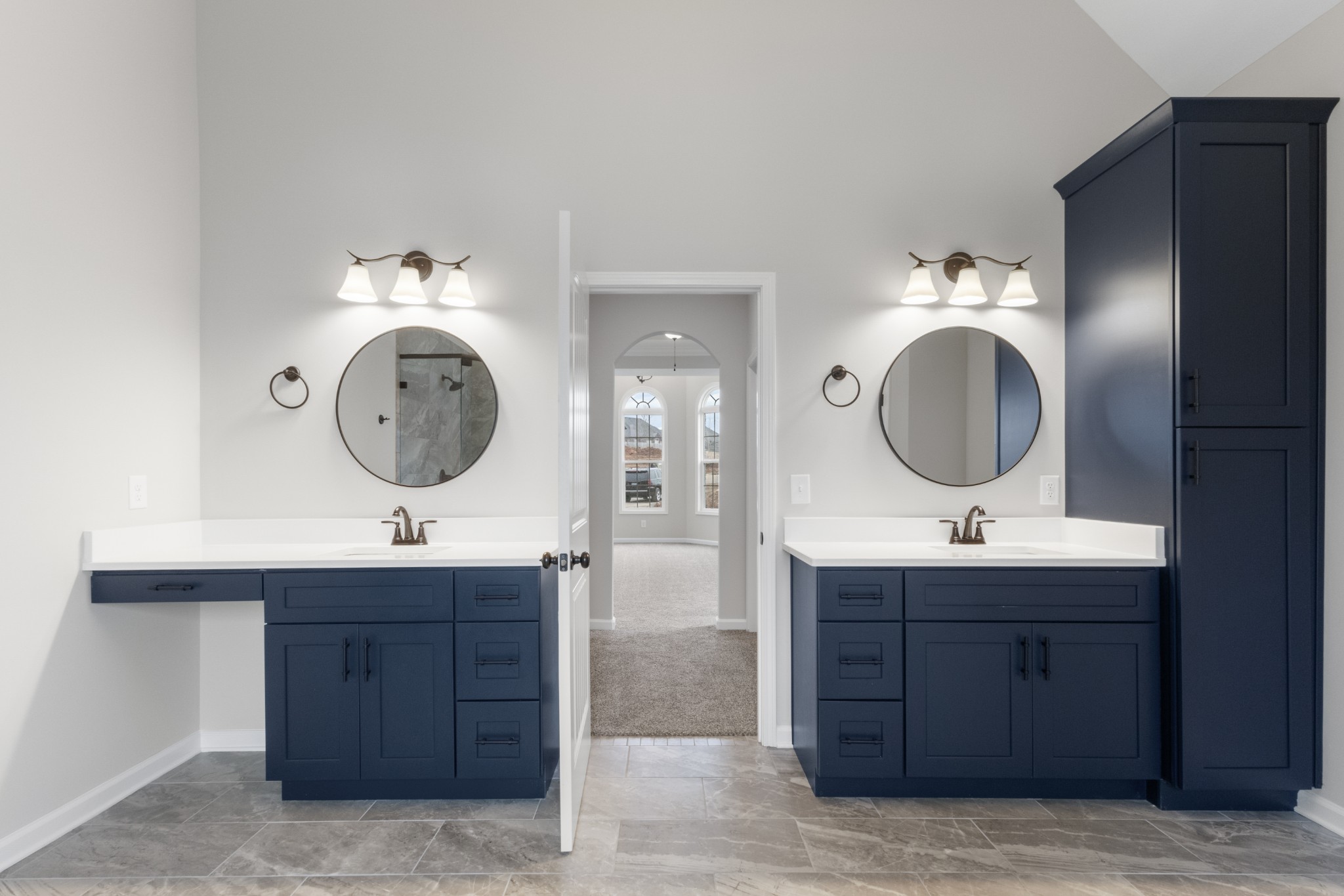 1173 Juniper Pass Clarksville, TN 37043 - Photo 27 of 51 a bathroom with a double vanity sink and a mirror