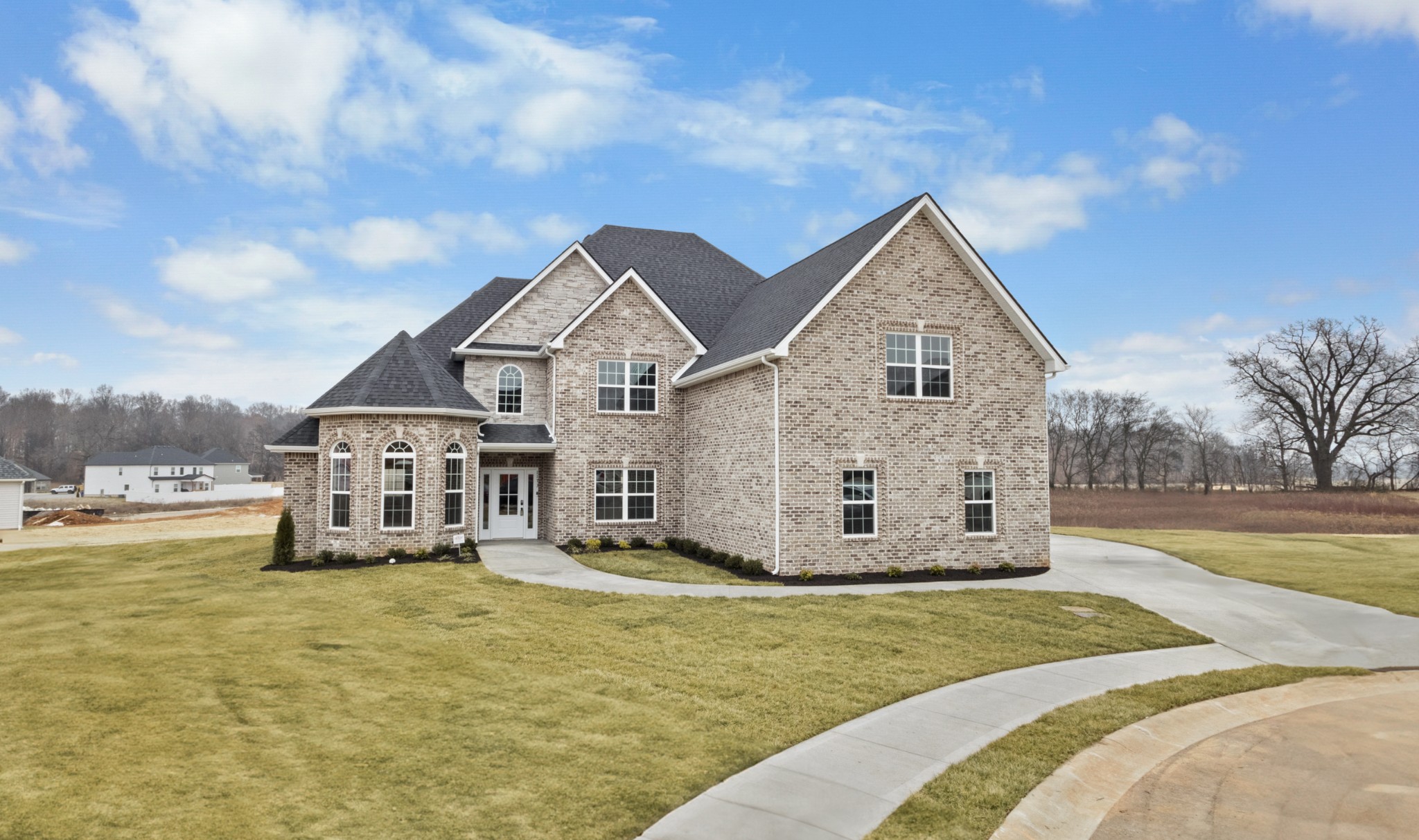 1173 Juniper Pass Clarksville, TN 37043 - Photo 4 of 51 a view of a house with a big yard and large trees