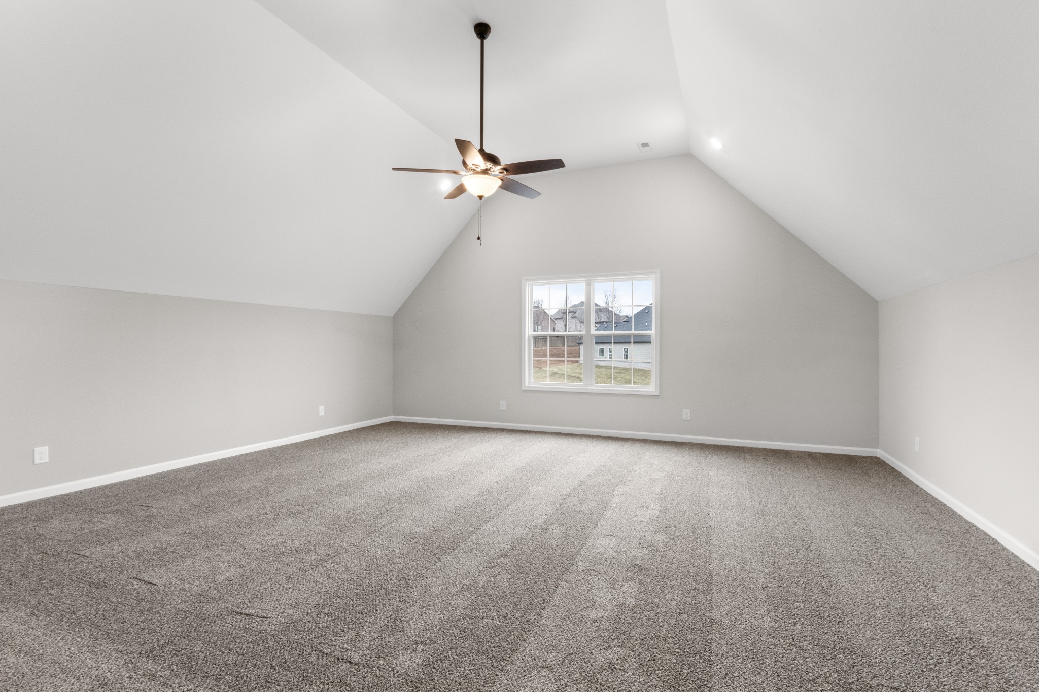 1173 Juniper Pass Clarksville, TN 37043 - Photo 42 of 51 an empty room with a view of a ceiling fan and a window
