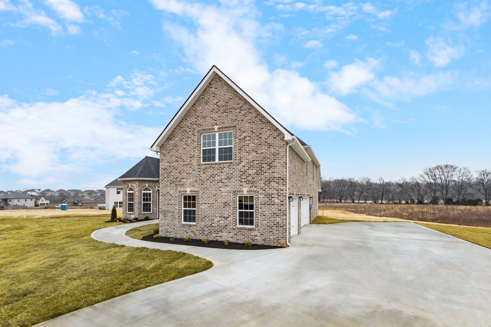1173 Juniper Pass Clarksville, TN 37043 - Photo 6 of 51 a view of a house with a yard and sitting area