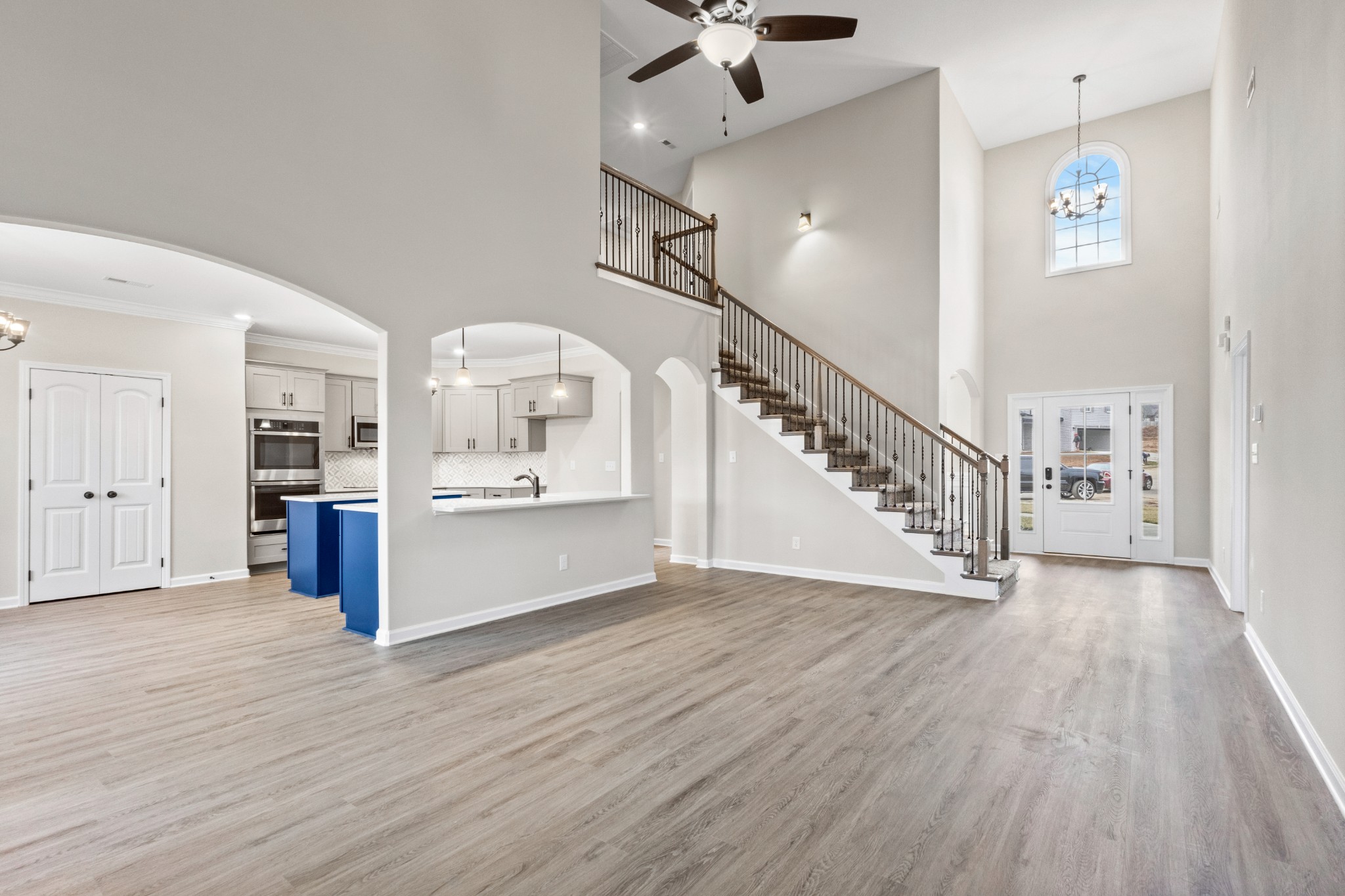 1173 Juniper Pass Clarksville, TN 37043 - Photo 10 of 51 a view of an empty room and kitchen view with wooden floor