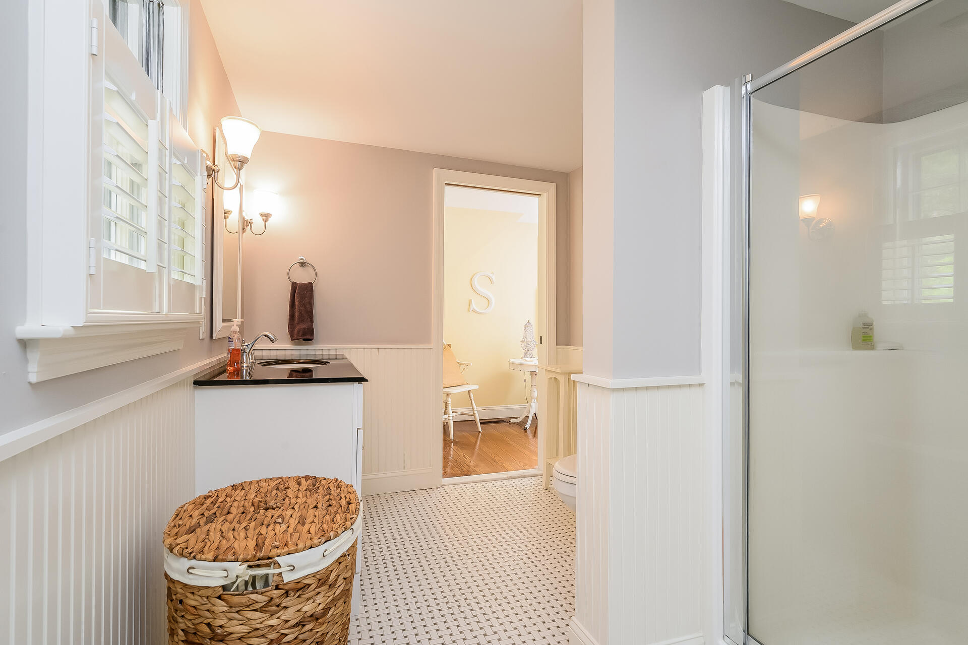 44 Cedarwood Road Cotuit, MA 02635 - Photo 13 of 19 a bathroom with a granite countertop sink and a mirror