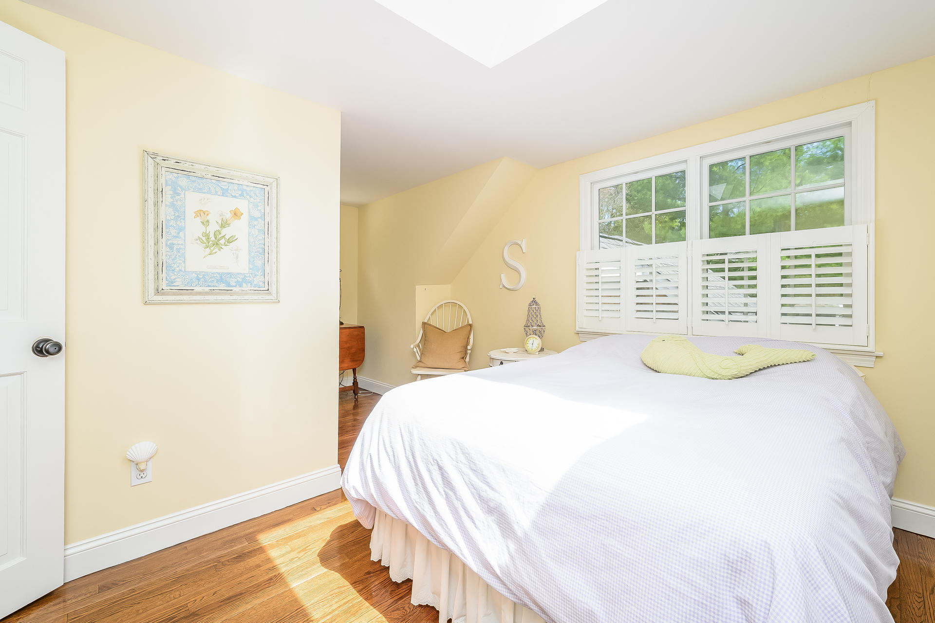 44 Cedarwood Road Cotuit, MA 02635 - Photo 15 of 19 a bedroom with a bed and a window