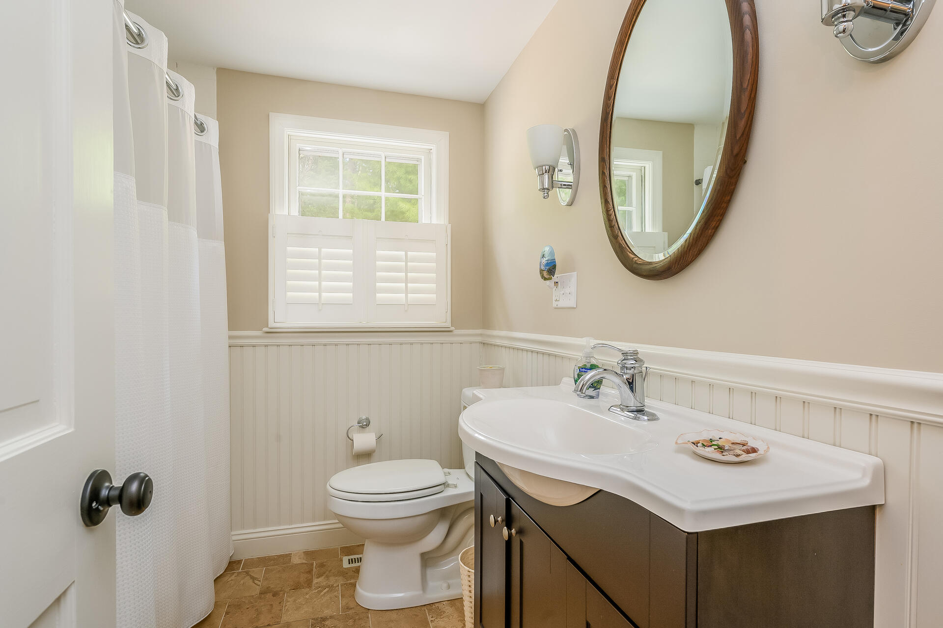 44 Cedarwood Road Cotuit, MA 02635 - Photo 17 of 19 a bathroom with a sink a toilet and a mirror