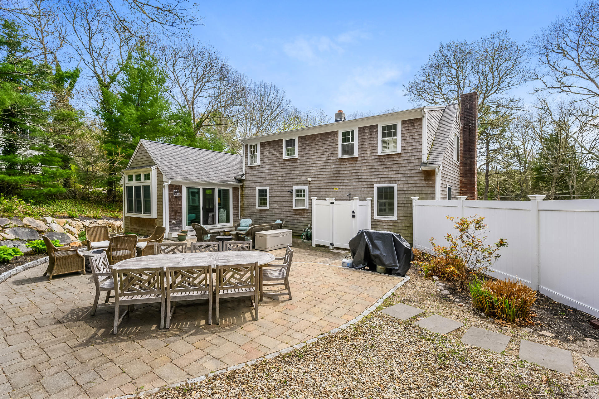 44 Cedarwood Road Cotuit, MA 02635 - Photo 19 of 19 a view of a house with backyard and sitting area