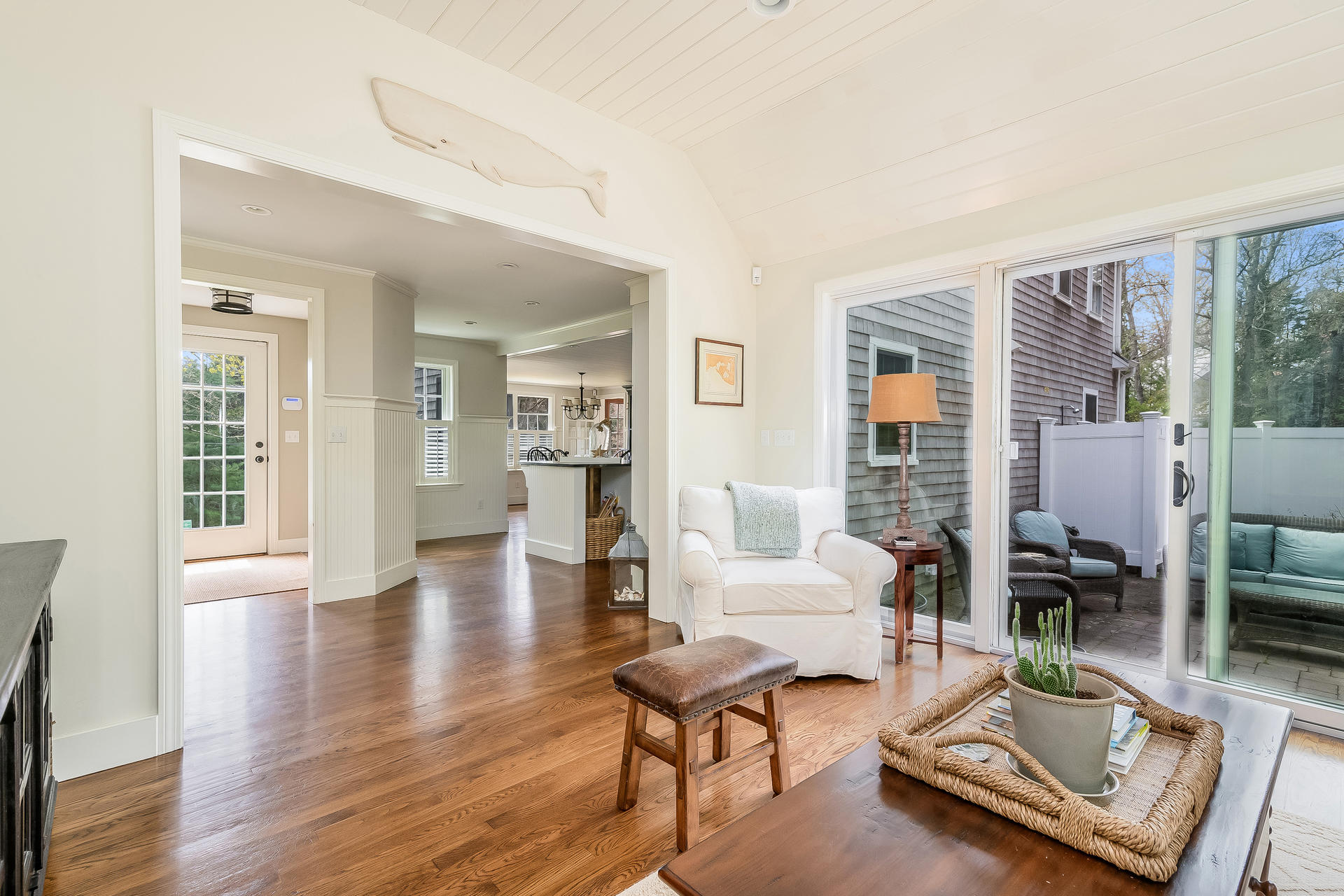44 Cedarwood Road Cotuit, MA 02635 - Photo 7 of 19 a living room with furniture and a table with wooden floor
