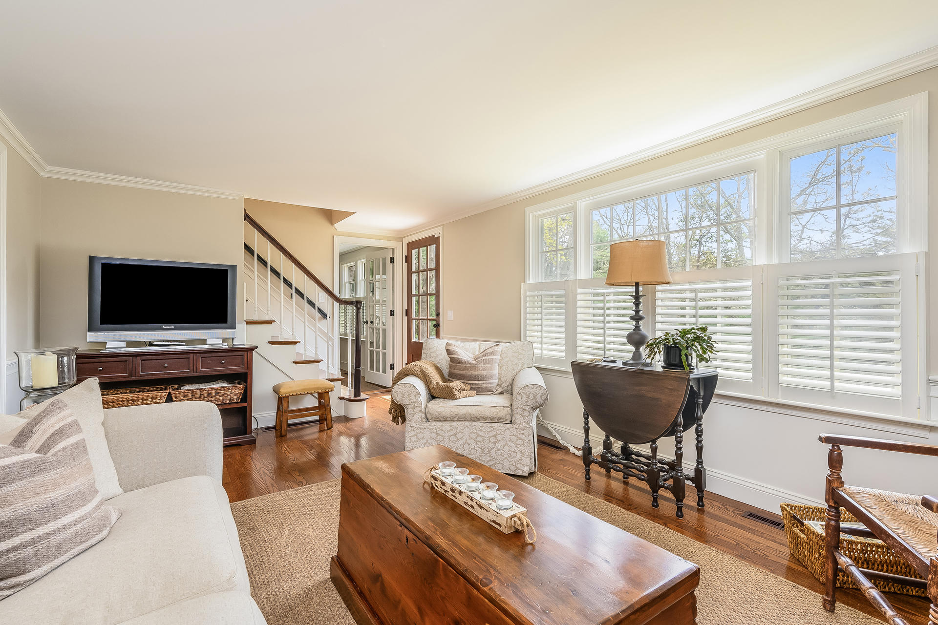 44 Cedarwood Road Cotuit, MA 02635 - Photo 8 of 19 a living room with furniture and a flat screen tv
