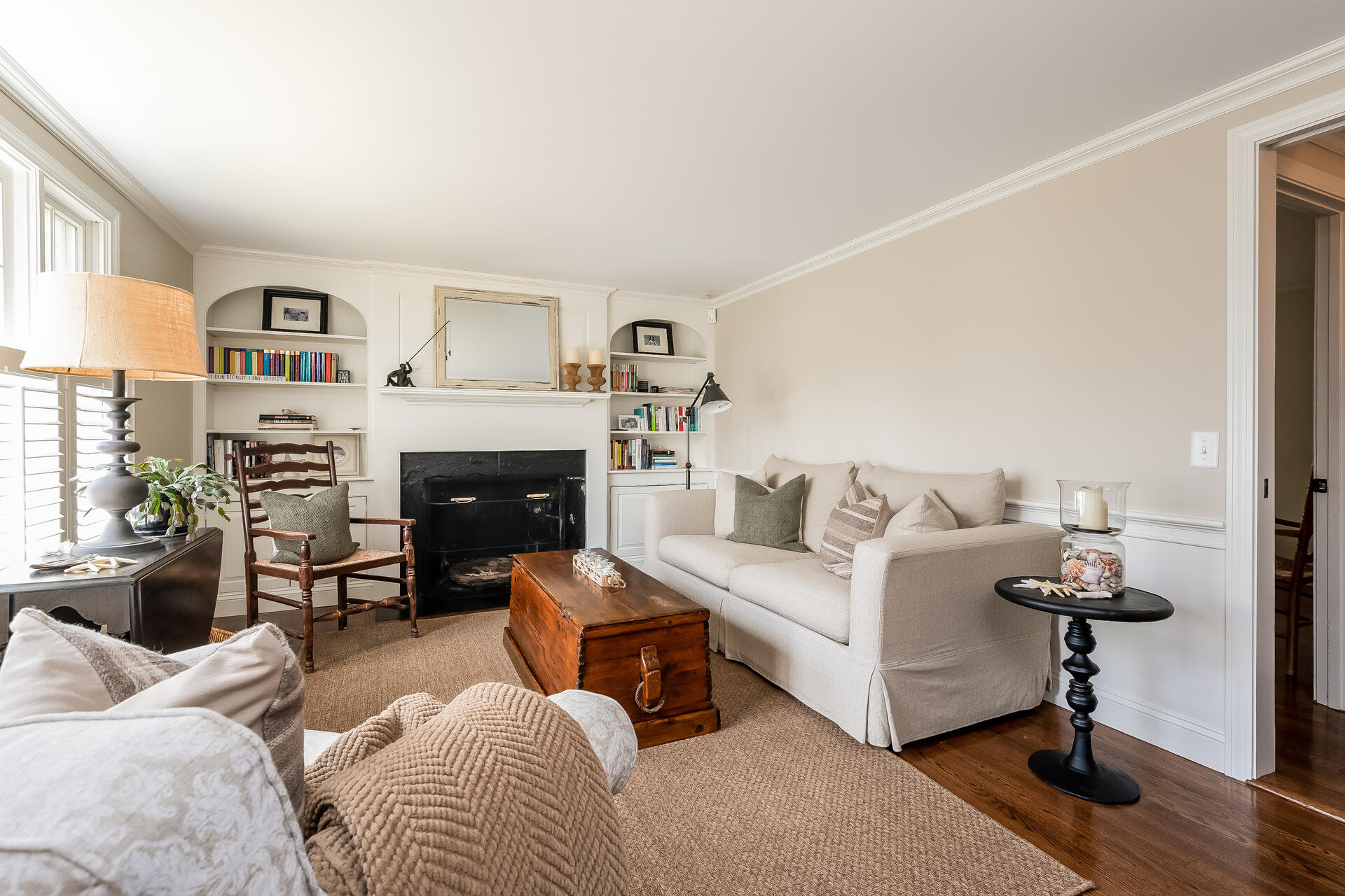 44 Cedarwood Road Cotuit, MA 02635 - Photo 10 of 19 a living room with furniture and a fireplace