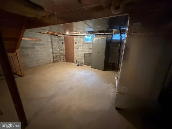 a view of a empty room with storage
