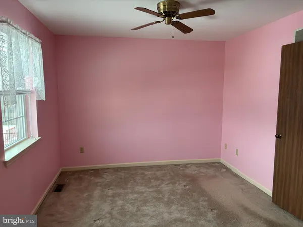 a view of a room with a window