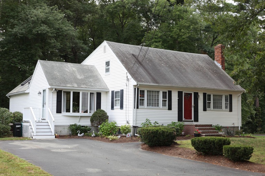 99 Spallus Road Stoughton, MA 02072 - Photo 1 of 14 a front view of a house with a yard