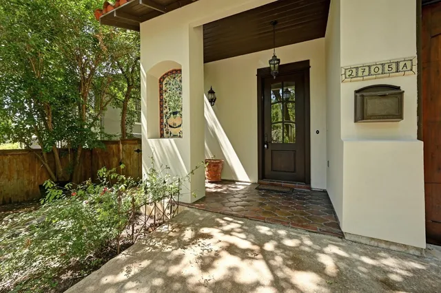 a view of a house with a porch