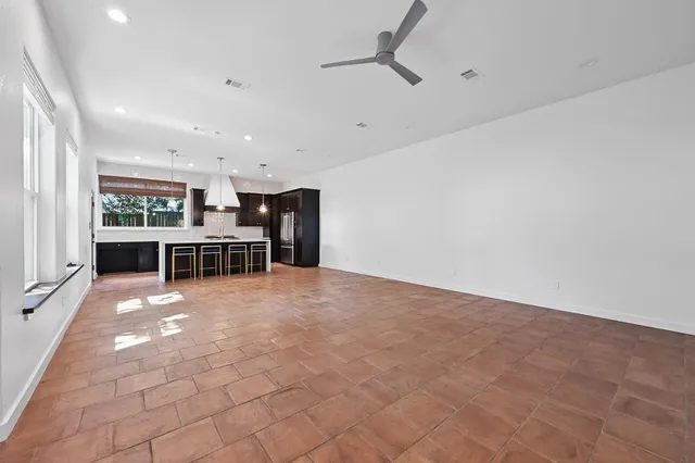 a view of kitchen with furniture and window