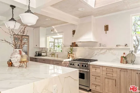 a view of a house with patio outdoor seating