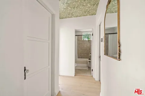 a view of a backyard of the house