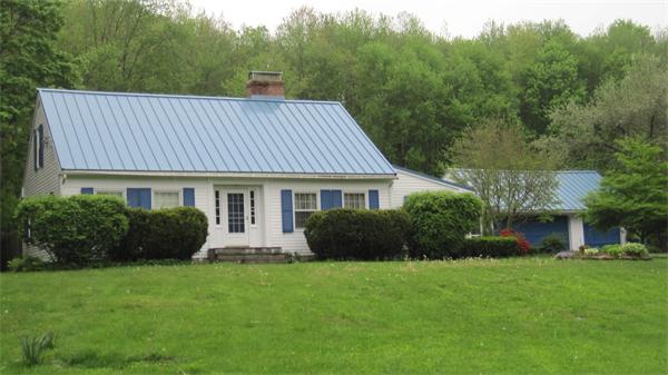 75 Amherst Road Leverett, MA 01054 - Photo 1 of 22 a front view of a house with a yard