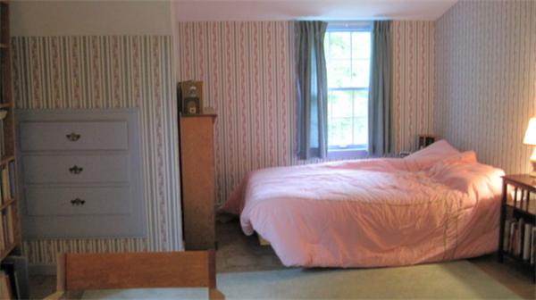 75 Amherst Road Leverett, MA 01054 - Photo 11 of 22 a bed room with a bed and a window