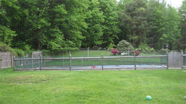 75 Amherst Road Leverett, MA 01054 - Photo 18 of 22 a view of park with benches and trees in the background