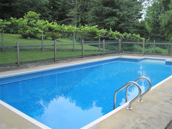 75 Amherst Road Leverett, MA 01054 - Photo 20 of 22 a view of a swimming pool with a backyard