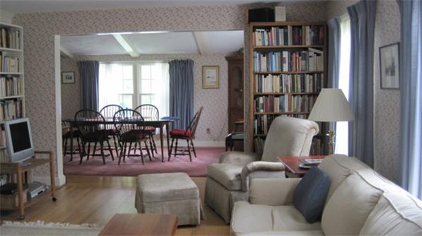 75 Amherst Road Leverett, MA 01054 - Photo 4 of 22 a living room with furniture and a book shelf