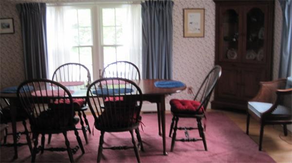 75 Amherst Road Leverett, MA 01054 - Photo 5 of 22 a view of a dining room with furniture and chandelier