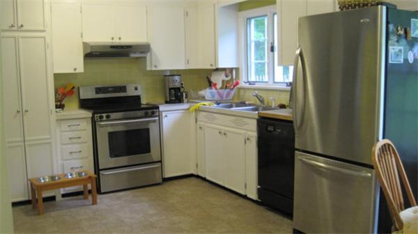 75 Amherst Road Leverett, MA 01054 - Photo 7 of 22 a kitchen with a stove refrigerator and sink