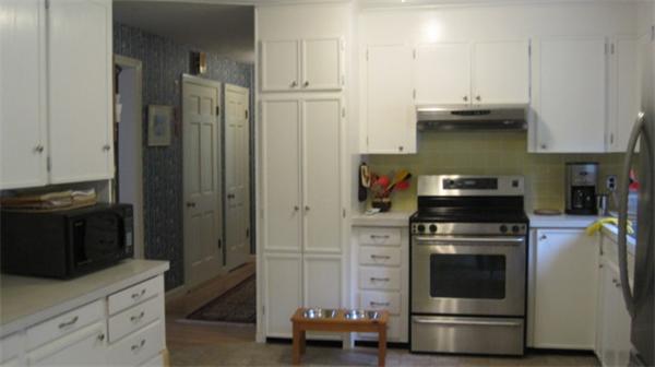 75 Amherst Road Leverett, MA 01054 - Photo 8 of 22 a kitchen with stainless steel appliances a stove a refrigerator and a cabinets