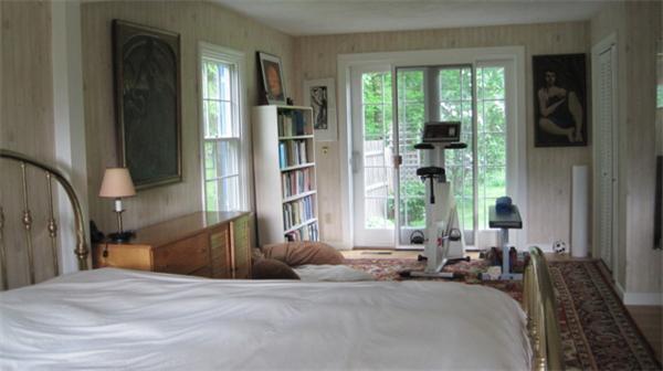 75 Amherst Road Leverett, MA 01054 - Photo 10 of 22 a bedroom with a bed and a large window