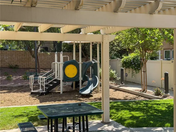a house view with a backyard space