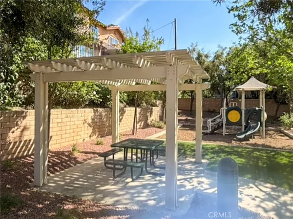 a view of a house with a yard balcony