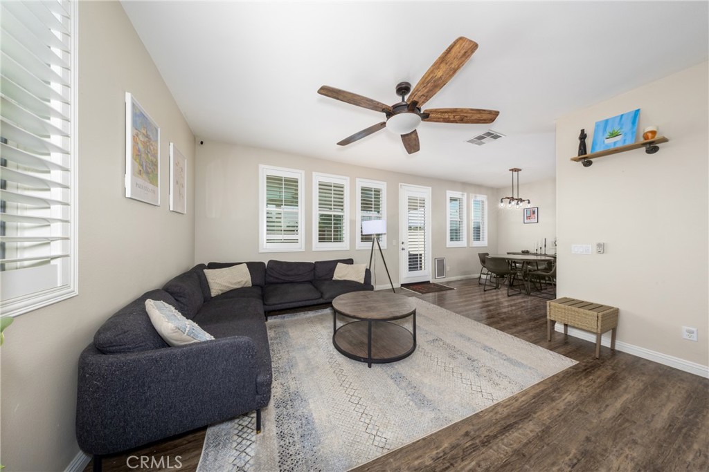 12068 Preston Street Grand Terrace, CA 92313 - Photo 6 of 34 a living room with furniture and a window