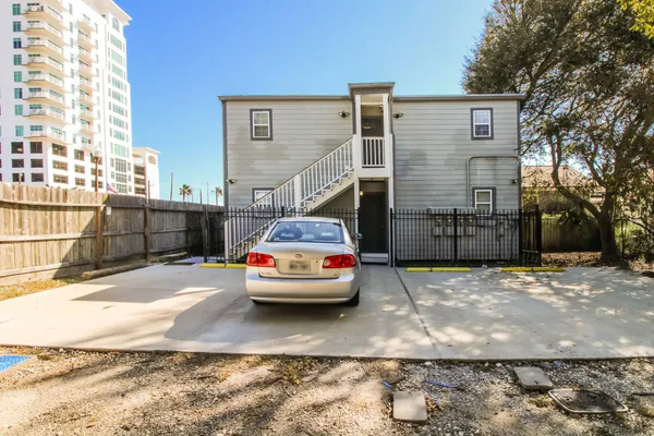 a view of parking area of a house
