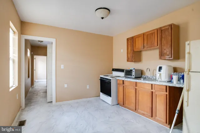 $199,990 | 108 North Stricker Street, Baltimore, MD 21223