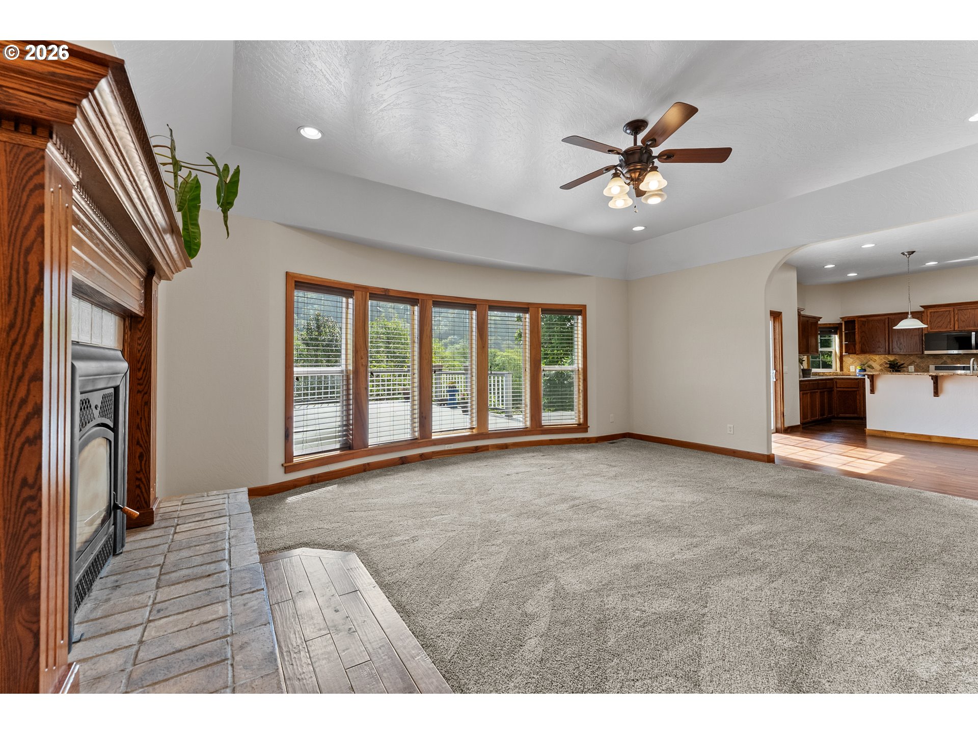 16711 Thompson Road Brookings, OR 97415 - Photo 12 of 45 a view of a livingroom with a ceiling fan and window