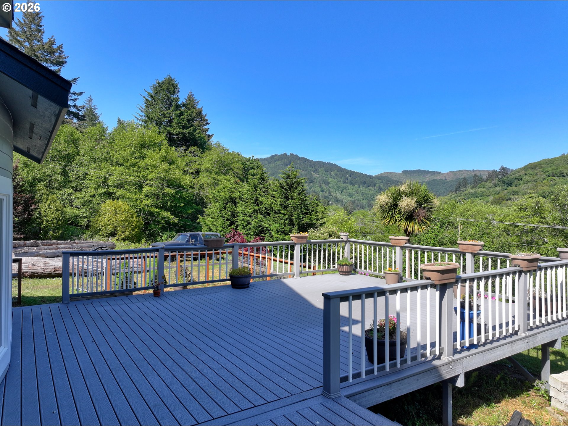 16711 Thompson Road Brookings, OR 97415 - Photo 32 of 45 a view of a balcony with a lake view