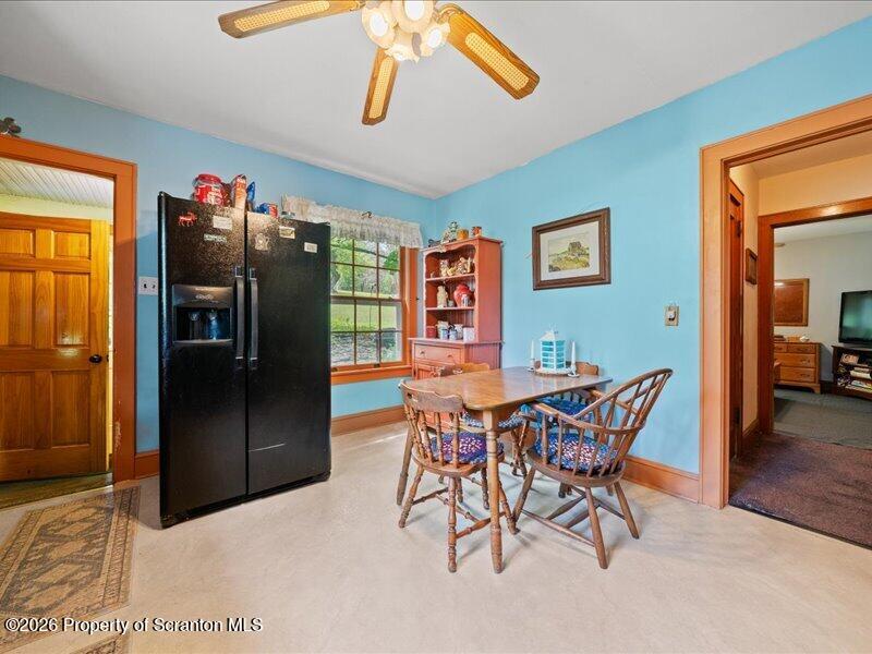 71 Pleasant Avenue Thompson, PA 18465 - Photo 11 of 37 a view of a dining room with furniture