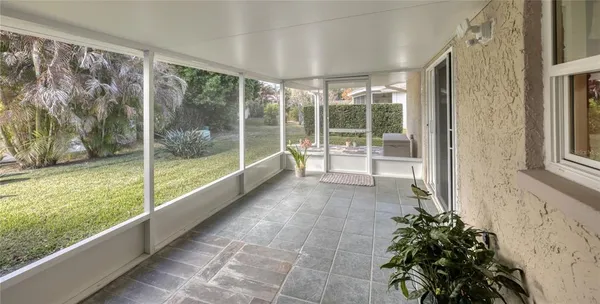 a view of a room with a large window