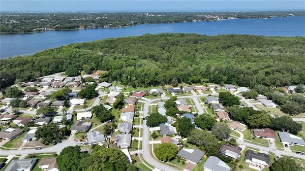 an aerial view of a houses with outdoor space
