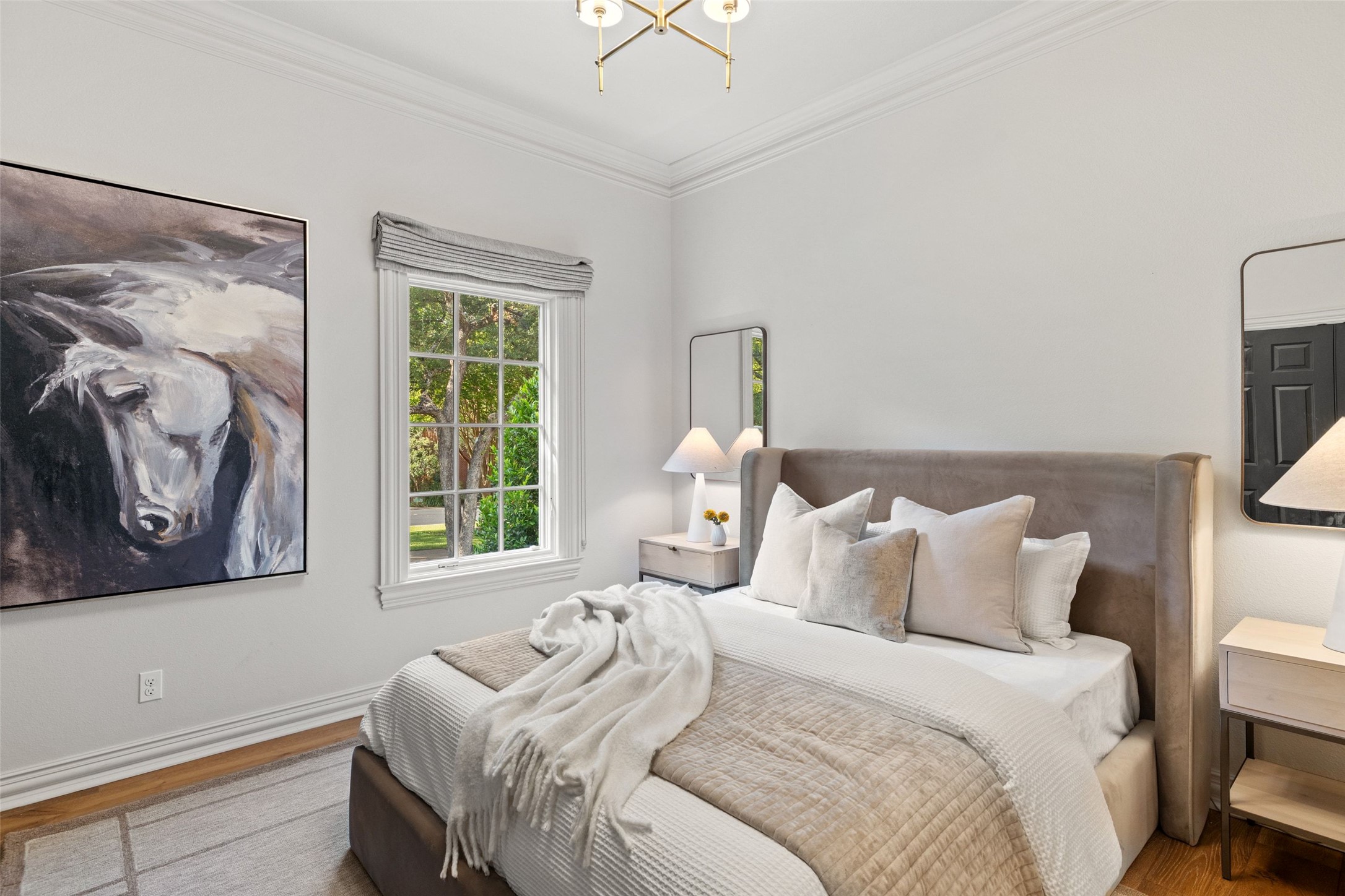 4201 Green Cliffs Road Austin, TX 78746 - Photo 21 of 40 Soft natural light makes this main-floor guest suite a comfortable, quiet haven for visiting friends or family