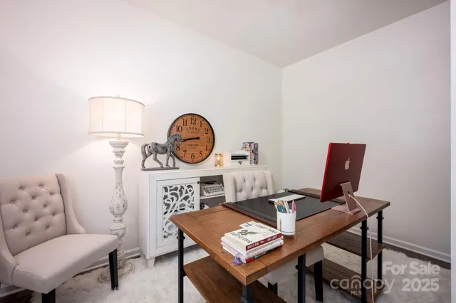 a view of a workspace with furniture