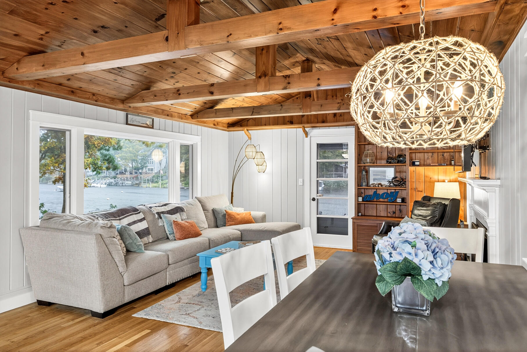 23 Childs River Road East Falmouth, MA 02536 - Photo 17 of 34 a living room with furniture and a large window