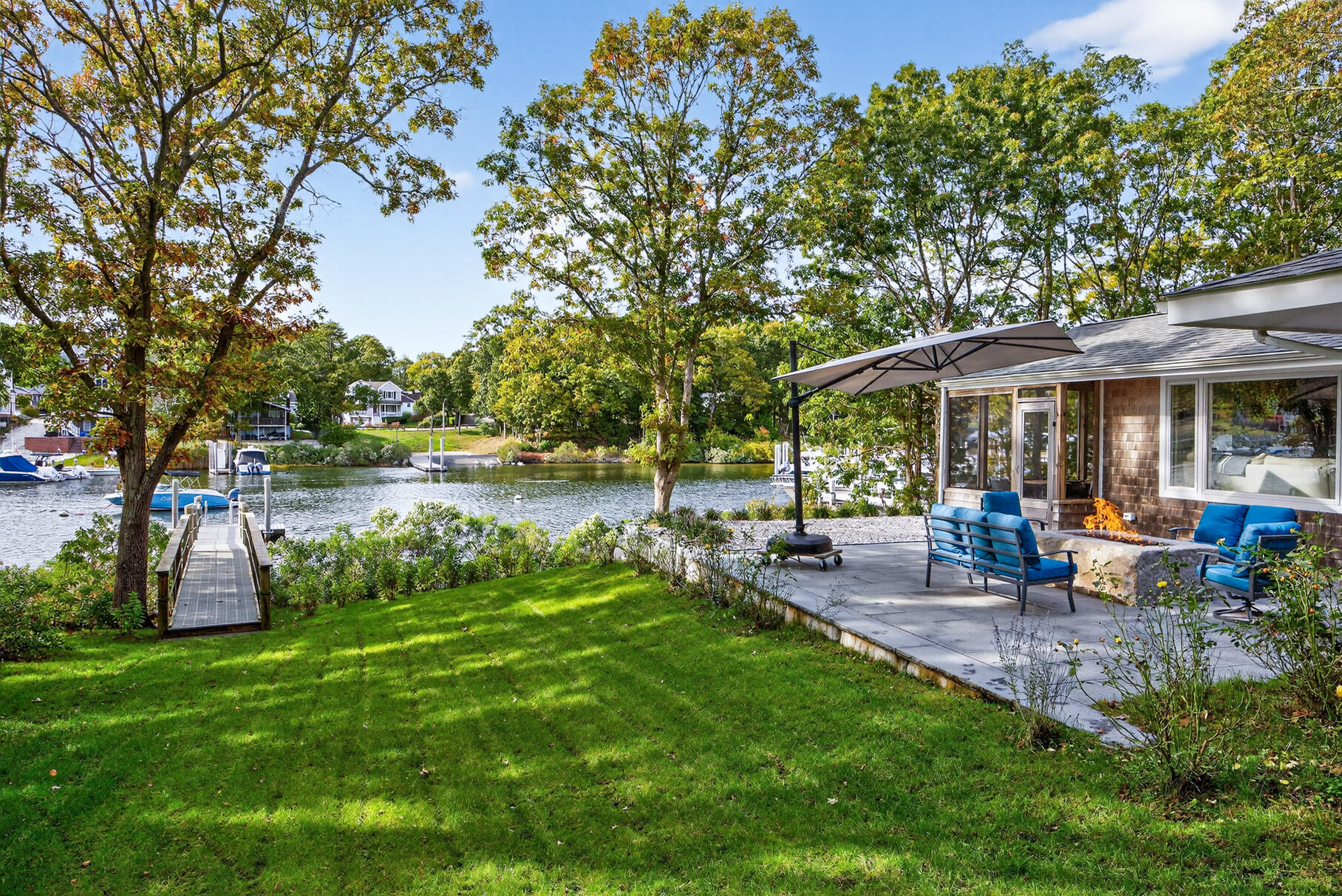 23 Childs River Road East Falmouth, MA 02536 - Photo 2 of 34 a view of a park with large trees