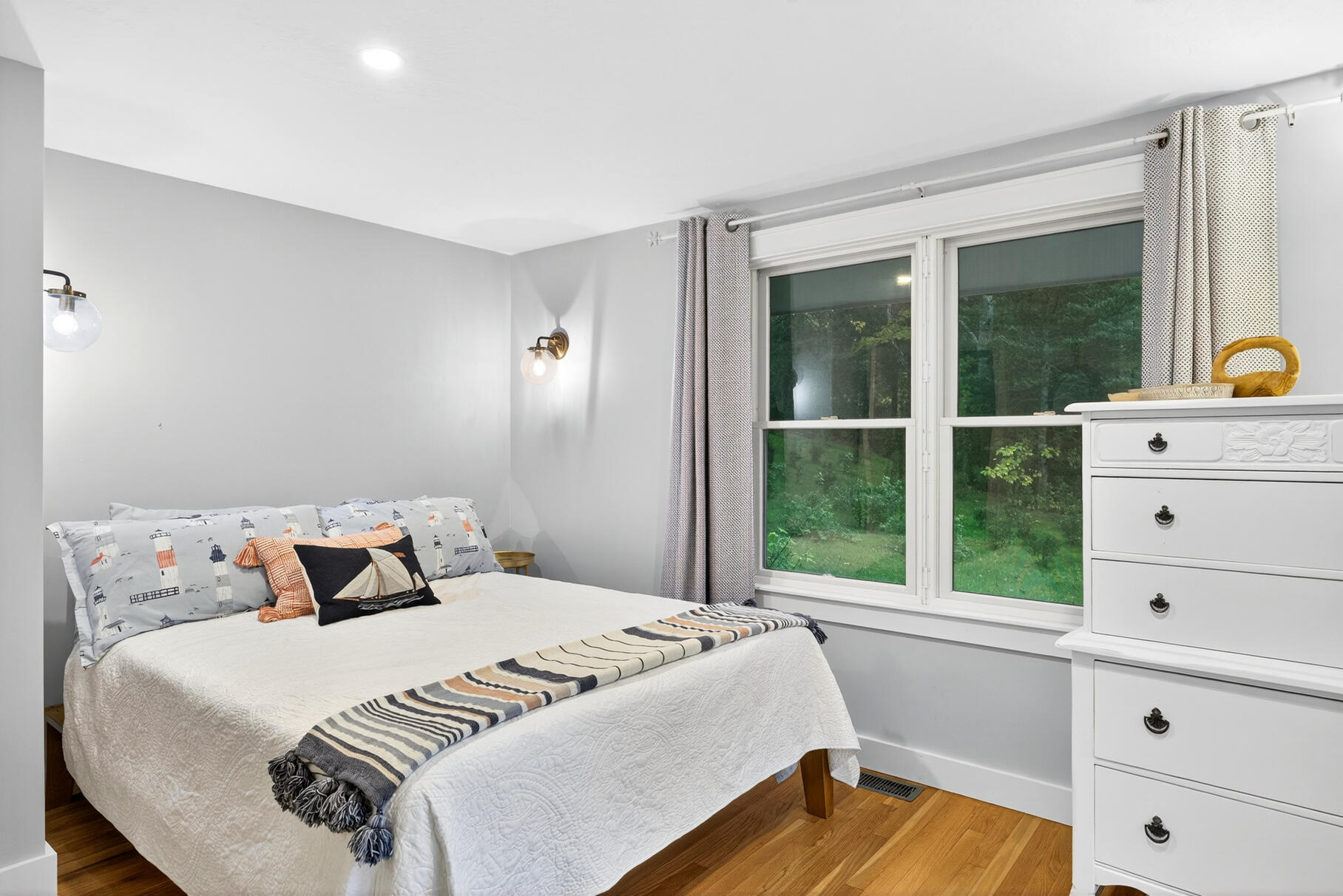 23 Childs River Road East Falmouth, MA 02536 - Photo 23 of 34 a bedroom with a bed and window