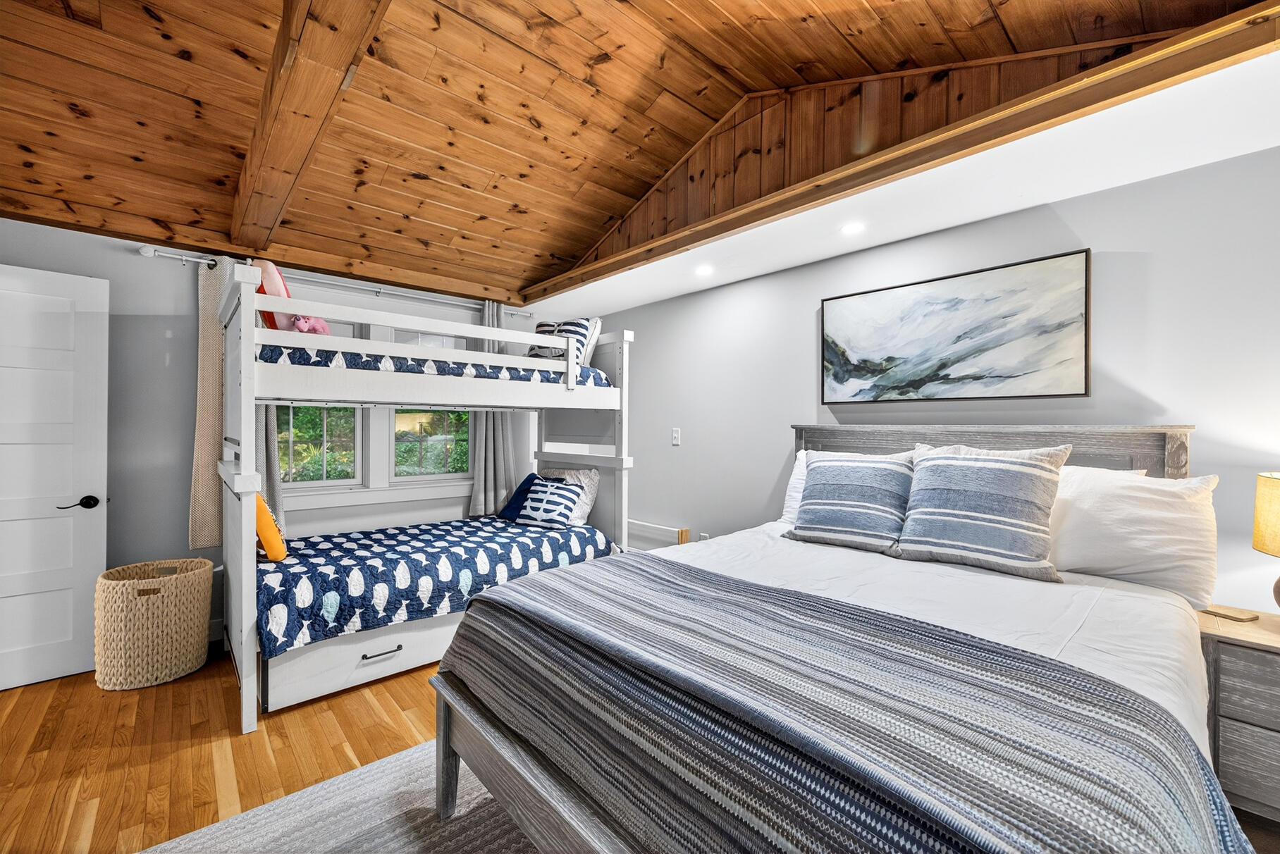 23 Childs River Road East Falmouth, MA 02536 - Photo 25 of 34 a bedroom with a bed and wooden floor