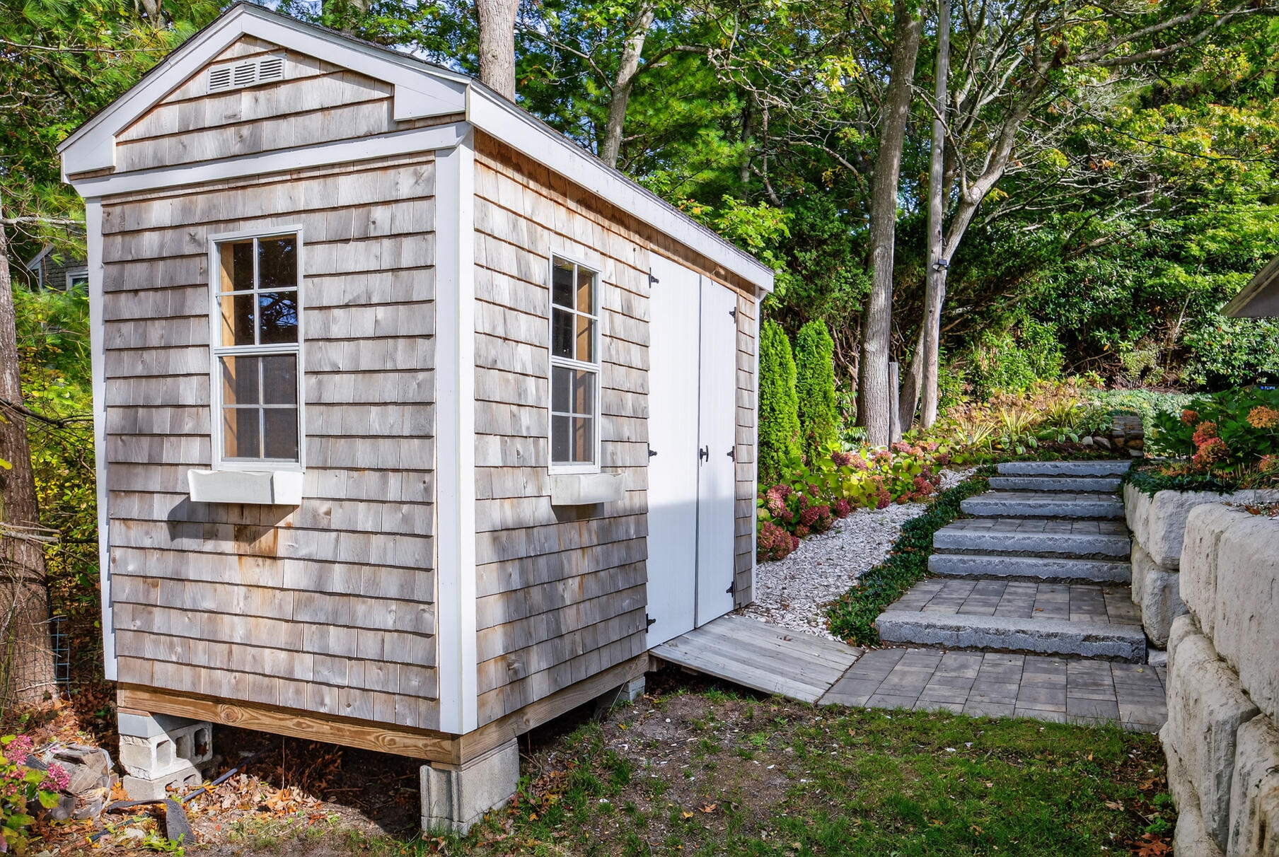 23 Childs River Road East Falmouth, MA 02536 - Photo 6 of 34 a view of a house with backyard and trees