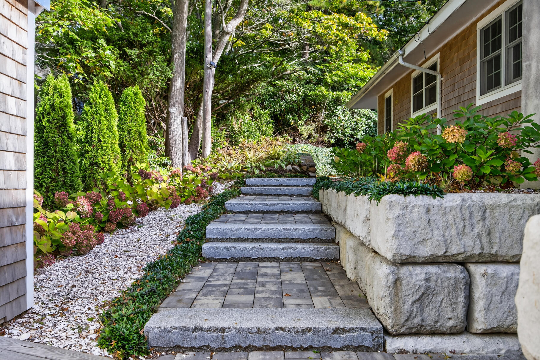 23 Childs River Road East Falmouth, MA 02536 - Photo 7 of 34 a view of a garden with pathway